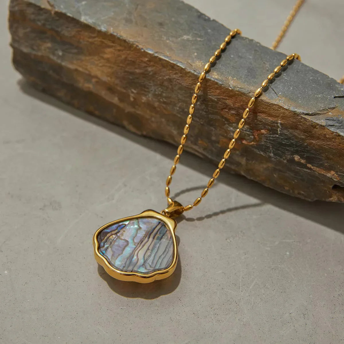 Nixie Gold Seashell Pendant